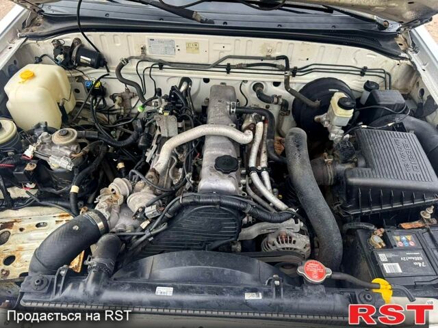 Белый Форд Рейнджер, объемом двигателя 2.5 л и пробегом 244 тыс. км за 4500 $, фото 6 на Automoto.ua