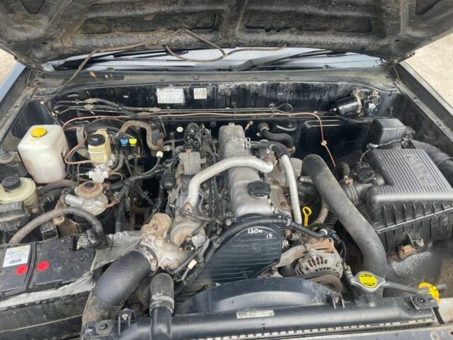 Черный Форд Рейнджер, объемом двигателя 2.5 л и пробегом 286 тыс. км за 3800 $, фото 9 на Automoto.ua