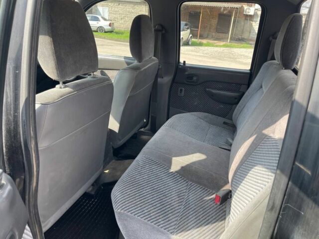 Черный Форд Рейнджер, объемом двигателя 2.5 л и пробегом 286 тыс. км за 3800 $, фото 7 на Automoto.ua