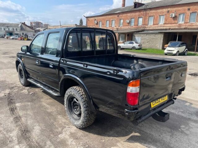 Черный Форд Рейнджер, объемом двигателя 2.5 л и пробегом 286 тыс. км за 3800 $, фото 5 на Automoto.ua