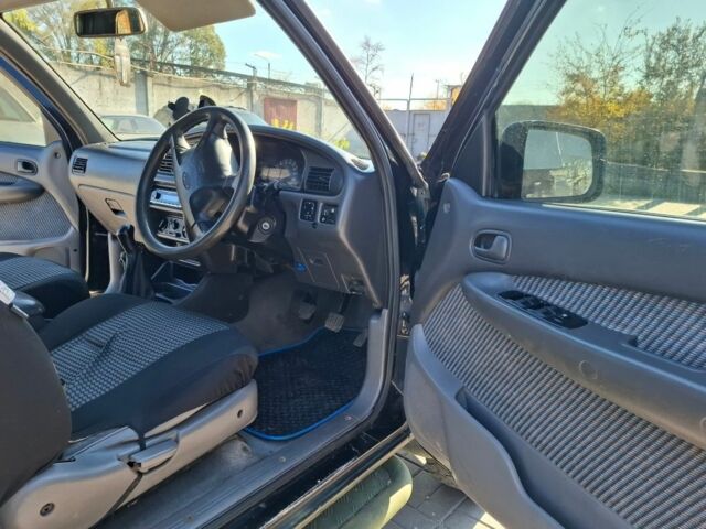 Черный Форд Рейнджер, объемом двигателя 2.5 л и пробегом 182 тыс. км за 4000 $, фото 5 на Automoto.ua