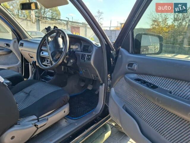 Черный Форд Рейнджер, объемом двигателя 2.5 л и пробегом 182 тыс. км за 4000 $, фото 2 на Automoto.ua