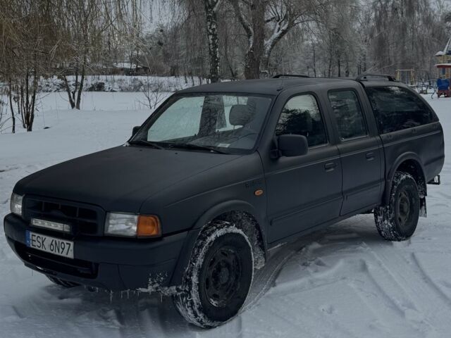 Черный Форд Рейнджер, объемом двигателя 2.5 л и пробегом 230 тыс. км за 4200 $, фото 1 на Automoto.ua