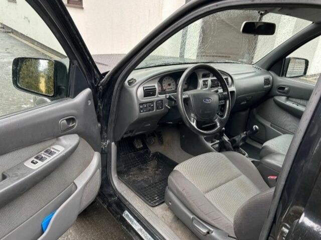 Черный Форд Рейнджер, объемом двигателя 2.5 л и пробегом 235 тыс. км за 2750 $, фото 9 на Automoto.ua