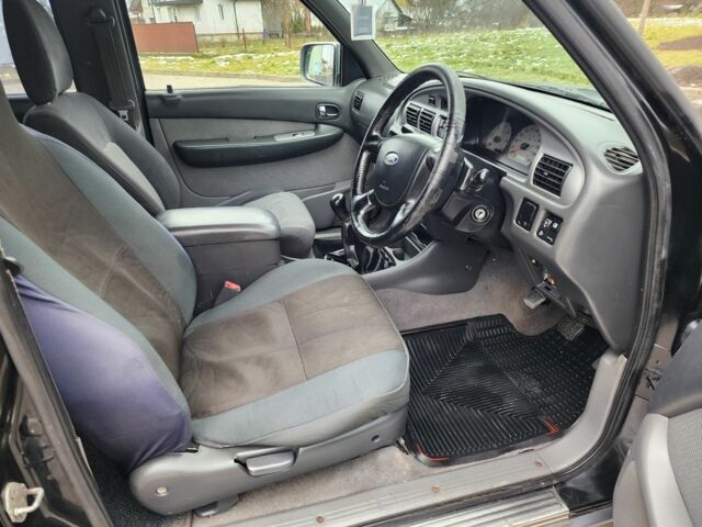 Черный Форд Рейнджер, объемом двигателя 2.5 л и пробегом 191 тыс. км за 6341 $, фото 11 на Automoto.ua