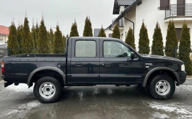 Черный Форд Рейнджер, объемом двигателя 2.5 л и пробегом 242 тыс. км за 2800 $, фото 1 на Automoto.ua