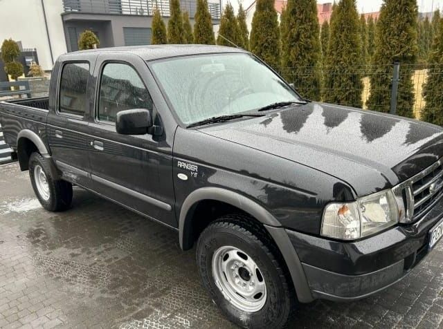 Черный Форд Рейнджер, объемом двигателя 2.5 л и пробегом 242 тыс. км за 2800 $, фото 7 на Automoto.ua
