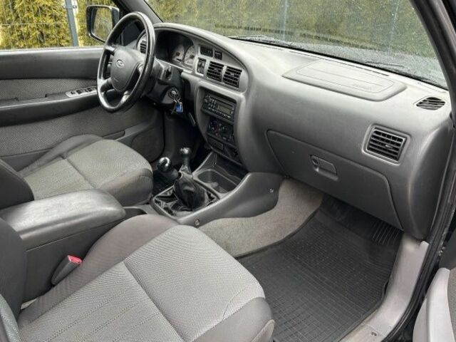 Черный Форд Рейнджер, объемом двигателя 2.5 л и пробегом 235 тыс. км за 2750 $, фото 8 на Automoto.ua