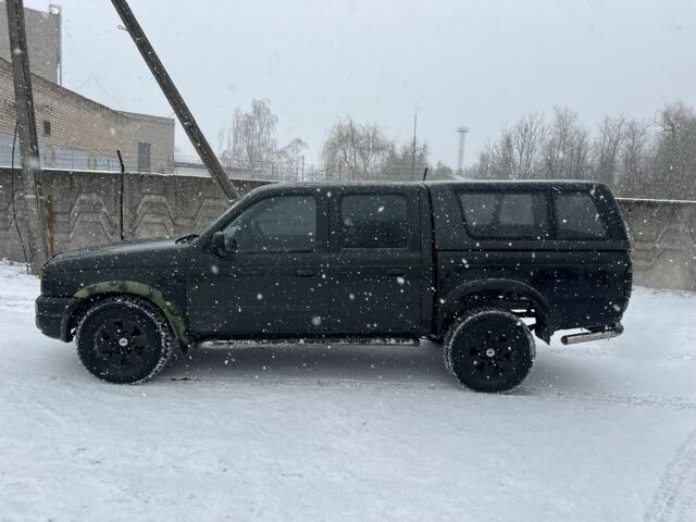 Черный Форд Рейнджер, объемом двигателя 2.5 л и пробегом 230 тыс. км за 3950 $, фото 5 на Automoto.ua