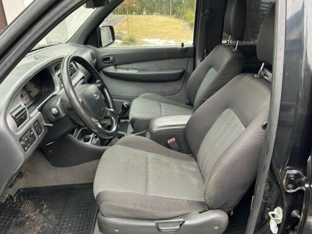 Черный Форд Рейнджер, объемом двигателя 2.5 л и пробегом 242 тыс. км за 2800 $, фото 6 на Automoto.ua