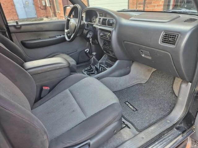 Черный Форд Рейнджер, объемом двигателя 2.5 л и пробегом 268 тыс. км за 2700 $, фото 9 на Automoto.ua