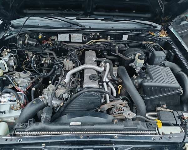 Черный Форд Рейнджер, объемом двигателя 2.5 л и пробегом 333 тыс. км за 5750 $, фото 4 на Automoto.ua