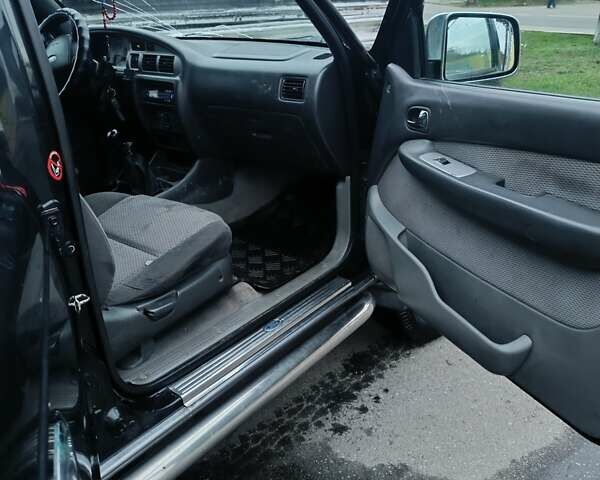 Черный Форд Рейнджер, объемом двигателя 2.5 л и пробегом 333 тыс. км за 5750 $, фото 5 на Automoto.ua