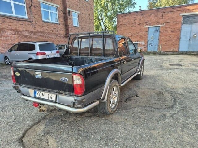 Черный Форд Рейнджер, объемом двигателя 2.5 л и пробегом 238 тыс. км за 2600 $, фото 7 на Automoto.ua