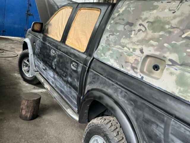 Черный Форд Рейнджер, объемом двигателя 2.5 л и пробегом 186 тыс. км за 7148 $, фото 12 на Automoto.ua