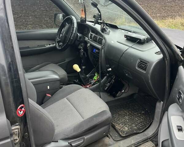 Черный Форд Рейнджер, объемом двигателя 2.5 л и пробегом 180 тыс. км за 6000 $, фото 6 на Automoto.ua