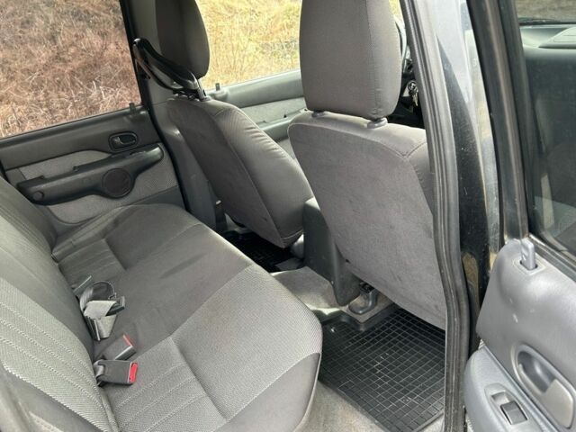 Черный Форд Рейнджер, объемом двигателя 2.5 л и пробегом 197 тыс. км за 2800 $, фото 14 на Automoto.ua