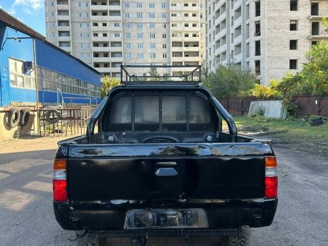 Чорний Форд Рейнджер, об'ємом двигуна 2.5 л та пробігом 210 тис. км за 4218 $, фото 6 на Automoto.ua