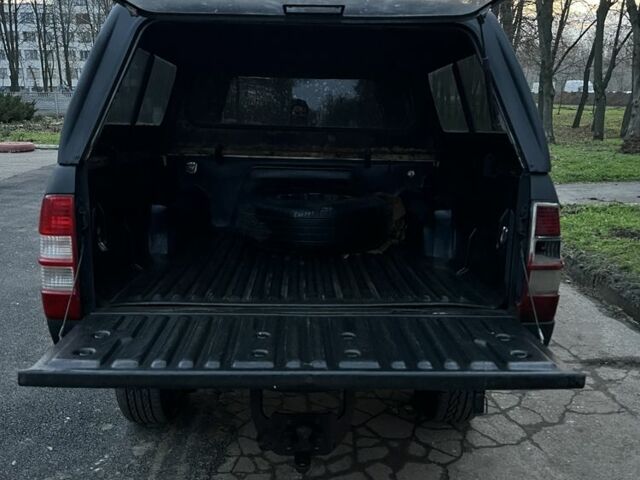 Черный Форд Рейнджер, объемом двигателя 2.5 л и пробегом 231 тыс. км за 5200 $, фото 9 на Automoto.ua