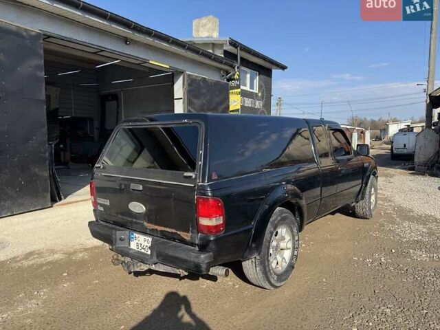Черный Форд Рейнджер, объемом двигателя 4 л и пробегом 200 тыс. км за 4500 $, фото 5 на Automoto.ua