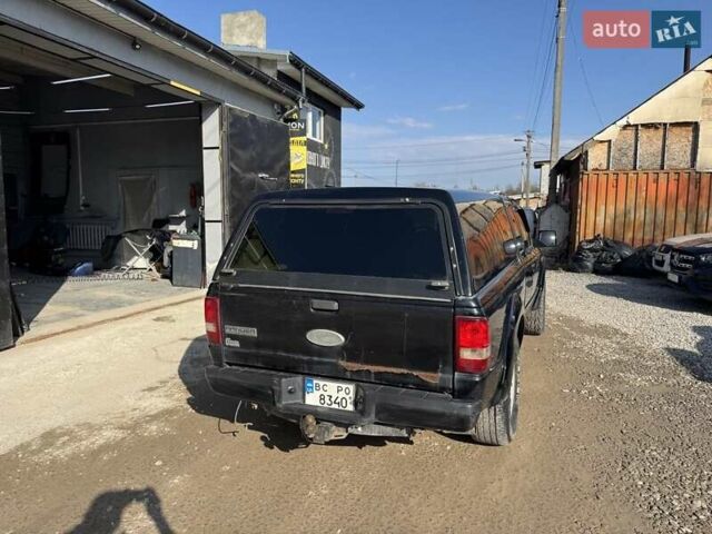 Черный Форд Рейнджер, объемом двигателя 4 л и пробегом 200 тыс. км за 4500 $, фото 1 на Automoto.ua
