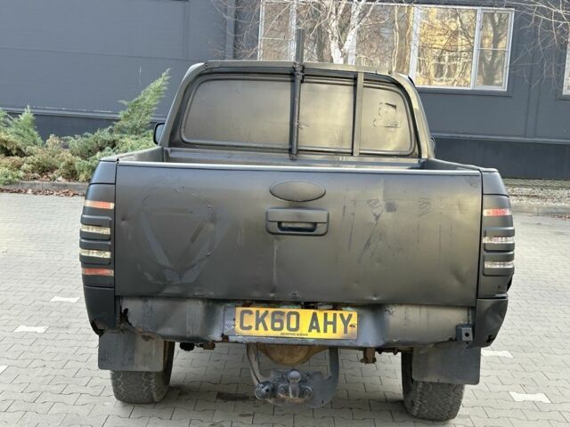 Черный Форд Рейнджер, объемом двигателя 2.5 л и пробегом 86 тыс. км за 4650 $, фото 3 на Automoto.ua