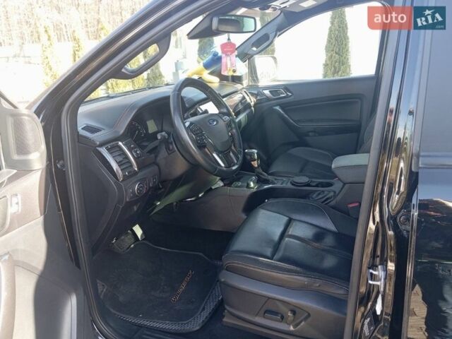 Черный Форд Рейнджер, объемом двигателя 2 л и пробегом 141 тыс. км за 28000 $, фото 19 на Automoto.ua