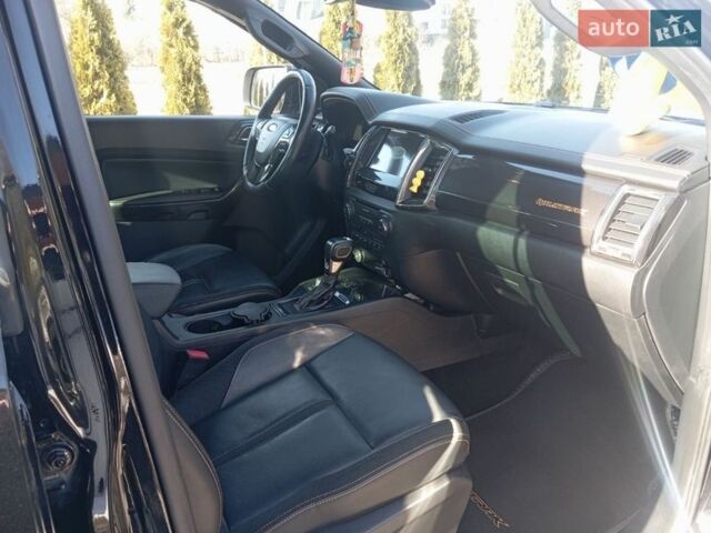 Черный Форд Рейнджер, объемом двигателя 2 л и пробегом 141 тыс. км за 28000 $, фото 16 на Automoto.ua