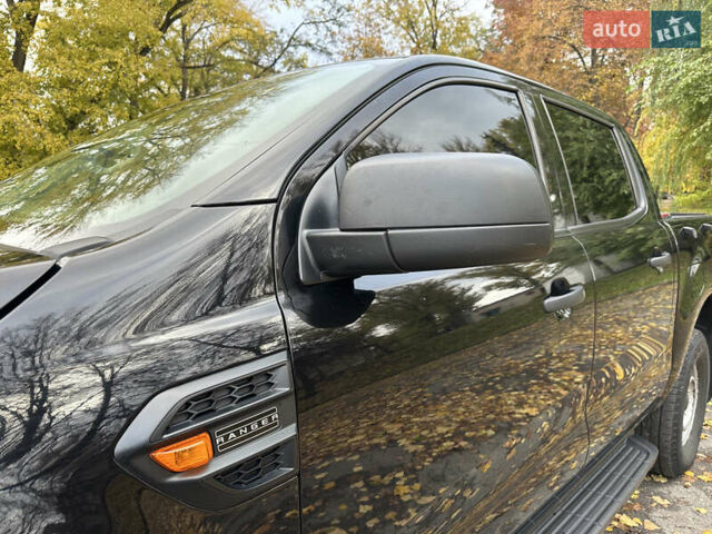 Черный Форд Рейнджер, объемом двигателя 2 л и пробегом 190 тыс. км за 29000 $, фото 4 на Automoto.ua