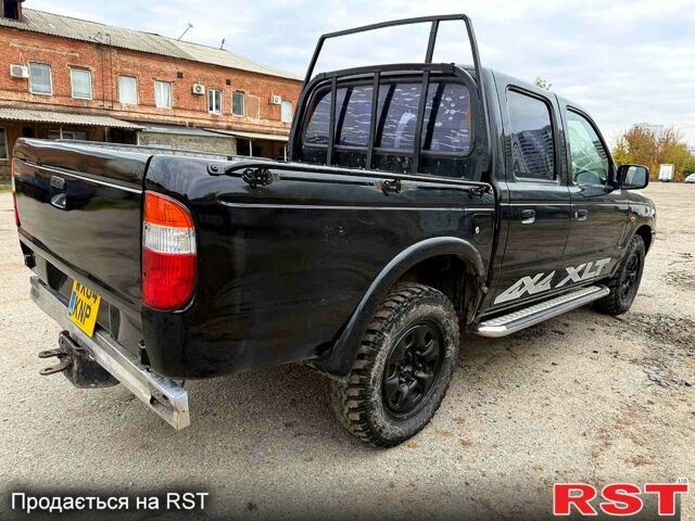 Черный Форд Рейнджер, объемом двигателя 2.5 л и пробегом 180 тыс. км за 3800 $, фото 5 на Automoto.ua