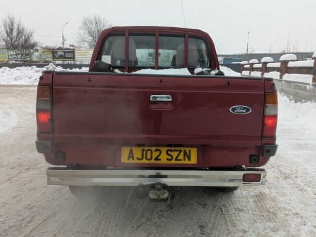 Красный Форд Рейнджер, объемом двигателя 2.5 л и пробегом 210 тыс. км за 4627 $, фото 5 на Automoto.ua