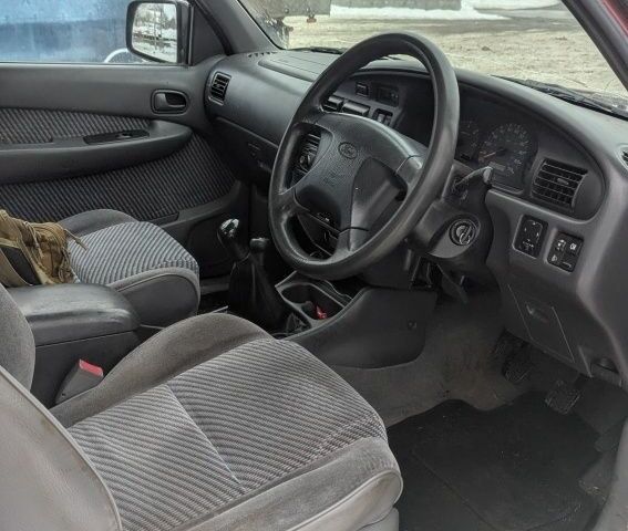 Красный Форд Рейнджер, объемом двигателя 2.5 л и пробегом 210 тыс. км за 4627 $, фото 6 на Automoto.ua