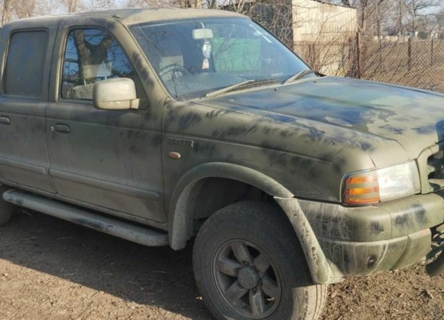 Красный Форд Рейнджер, объемом двигателя 2 л и пробегом 199 тыс. км за 5000 $, фото 5 на Automoto.ua