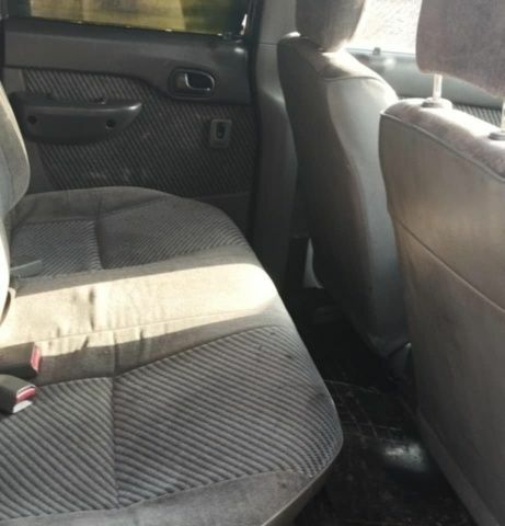 Красный Форд Рейнджер, объемом двигателя 2 л и пробегом 199 тыс. км за 5000 $, фото 4 на Automoto.ua