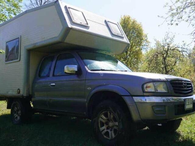 Серый Форд Рейнджер, объемом двигателя 2.5 л и пробегом 246 тыс. км за 11796 $, фото 5 на Automoto.ua