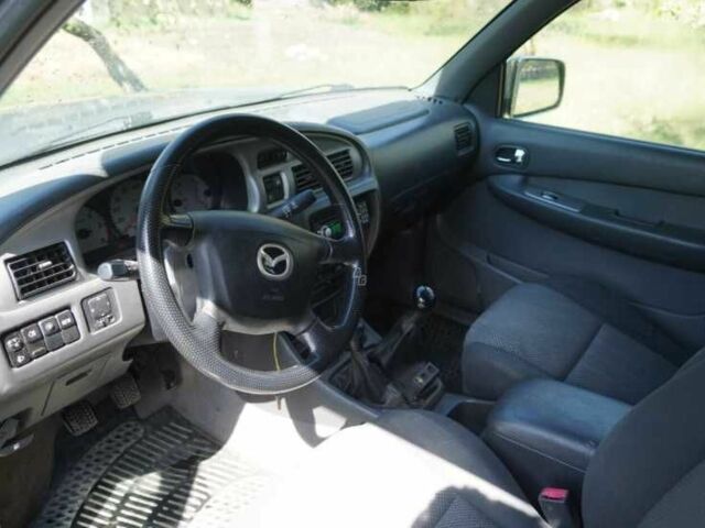 Серый Форд Рейнджер, объемом двигателя 2.5 л и пробегом 246 тыс. км за 11796 $, фото 6 на Automoto.ua