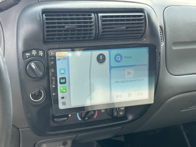 Синий Форд Рейнджер, объемом двигателя 4 л и пробегом 200 тыс. км за 5400 $, фото 6 на Automoto.ua