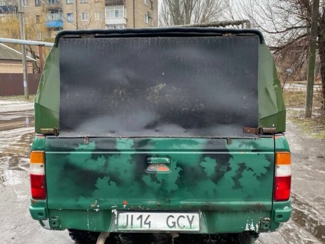 Зеленый Форд Рейнджер, объемом двигателя 2.5 л и пробегом 200 тыс. км за 2700 $, фото 4 на Automoto.ua