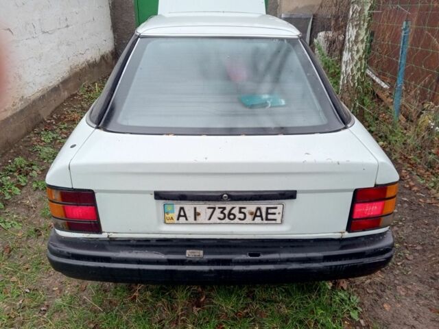 Білий Форд Скорпіо, об'ємом двигуна 2 л та пробігом 250 тис. км за 750 $, фото 1 на Automoto.ua