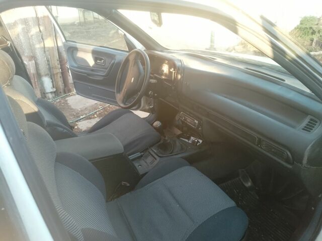 Белый Форд Скорпио, объемом двигателя 2 л и пробегом 300 тыс. км за 1075 $, фото 6 на Automoto.ua