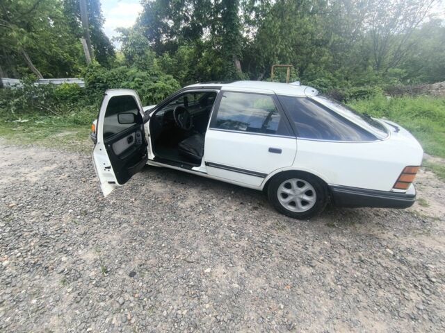 Белый Форд Скорпио, объемом двигателя 3 л и пробегом 345 тыс. км за 811 $, фото 1 на Automoto.ua