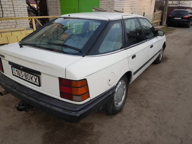 Белый Форд Скорпио, объемом двигателя 2 л и пробегом 500 тыс. км за 64000 $, фото 2 на Automoto.ua