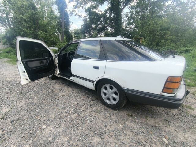 Белый Форд Скорпио, объемом двигателя 3 л и пробегом 345 тыс. км за 811 $, фото 5 на Automoto.ua