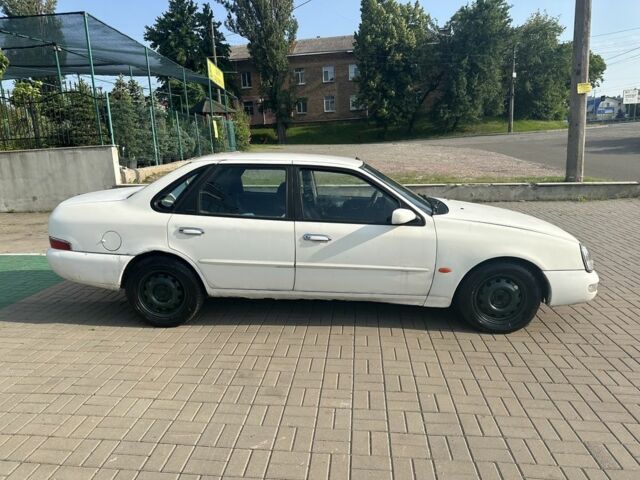 Білий Форд Скорпіо, об'ємом двигуна 2.3 л та пробігом 300 тис. км за 1100 $, фото 4 на Automoto.ua