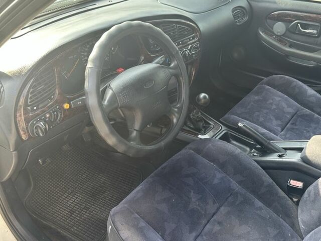 Білий Форд Скорпіо, об'ємом двигуна 2.3 л та пробігом 300 тис. км за 1100 $, фото 7 на Automoto.ua