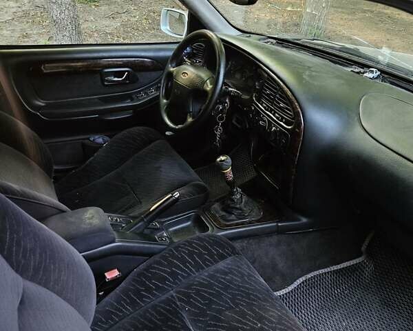 Белый Форд Скорпио, объемом двигателя 2.5 л и пробегом 348 тыс. км за 1500 $, фото 5 на Automoto.ua