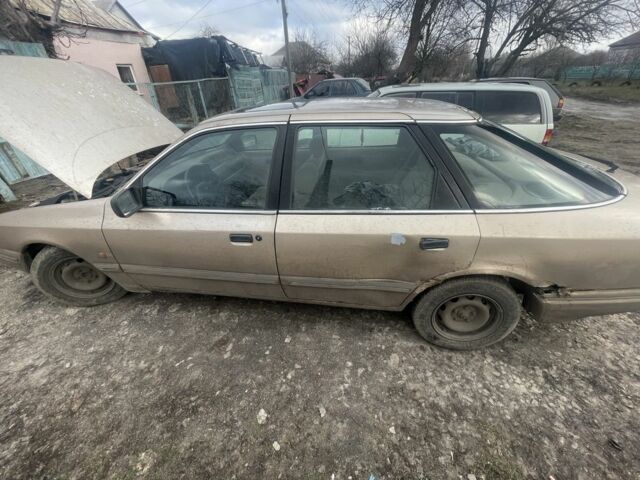 Бежевый Форд Скорпио, объемом двигателя 2 л и пробегом 300 тыс. км за 828 $, фото 1 на Automoto.ua