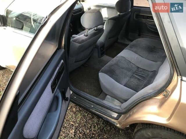 Бежевый Форд Скорпио, объемом двигателя 2.4 л и пробегом 300 тыс. км за 1250 $, фото 8 на Automoto.ua