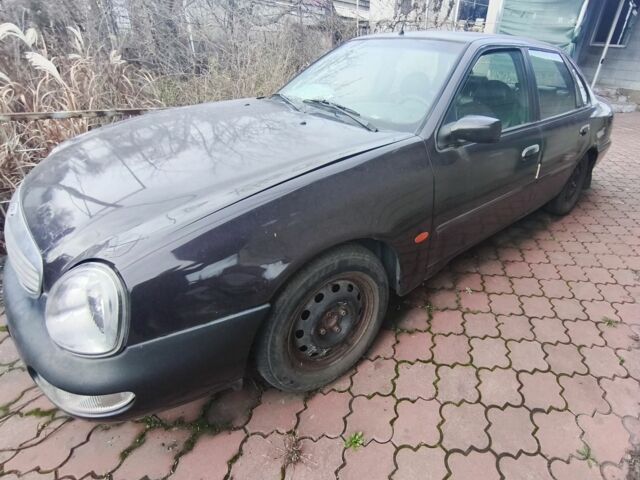 Бежевый Форд Скорпио, объемом двигателя 2 л и пробегом 2 тыс. км за 700 $, фото 2 на Automoto.ua