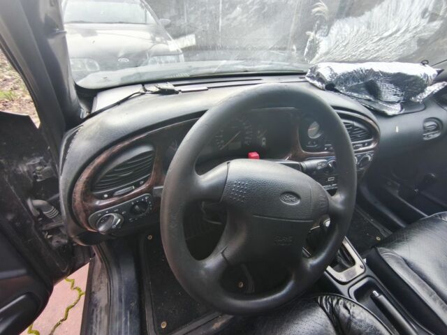 Бежевый Форд Скорпио, объемом двигателя 2 л и пробегом 2 тыс. км за 700 $, фото 4 на Automoto.ua